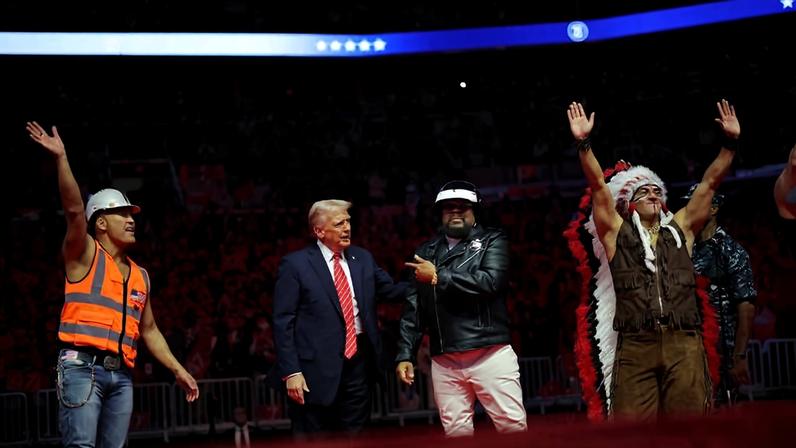 FILE PHOTO: U.S. President-elect Donald Trump stands next to Victor Willis, member of the Village People during a rally the day before he is scheduled to be inaugurated for a second term, in Washington, U.S., January 19, 2025. REUTERS/Carlos Barria/File Photo ORG XMIT: LIVE