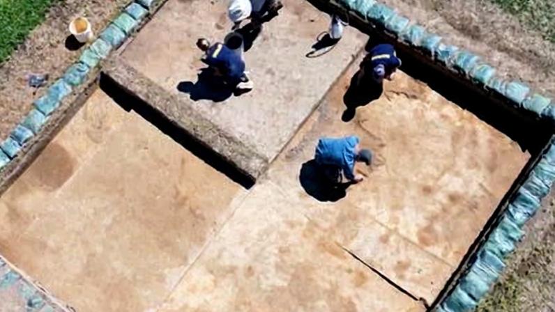 People dig at an archaeological site.