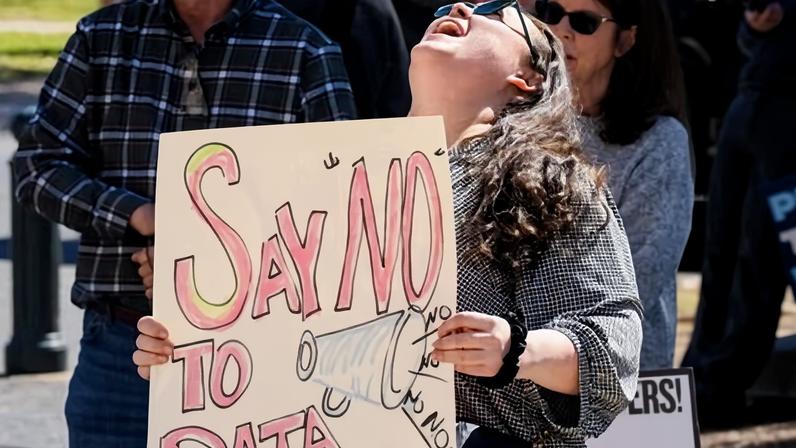 Advocacy groups and community members protest against datacenters outside the Texas capital in Austin in February.