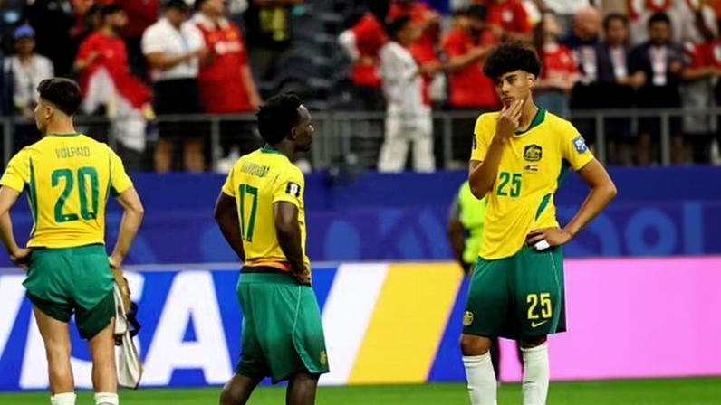 Australia's Cristian Volpato, Nestory Irankunda and Lucas Herrington look dejected after losing in a penalty shootout against Egypt in the World Cup last 32.
