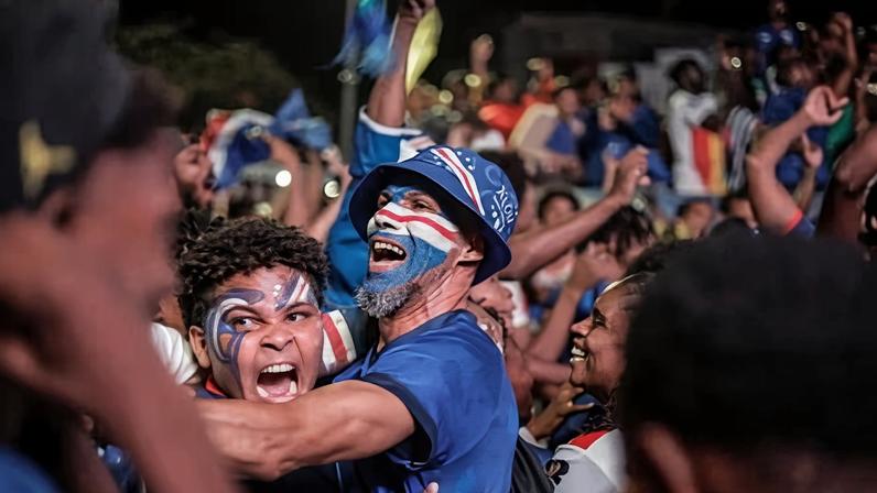 Cape Verde supporters show their delight in Praia after the Blue Sharks qualify for the knockout stages.