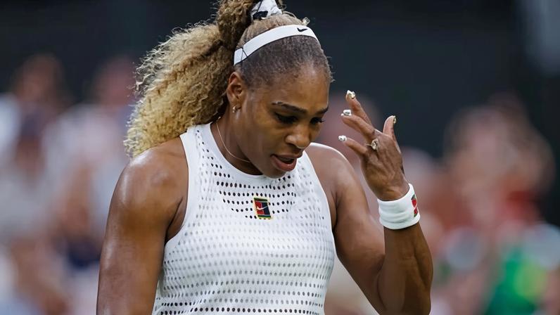Serena Williams looks dejected as she is beaten by Maya Joint. The veteran American twisted her knee in the first set of her Wimbledon return.
