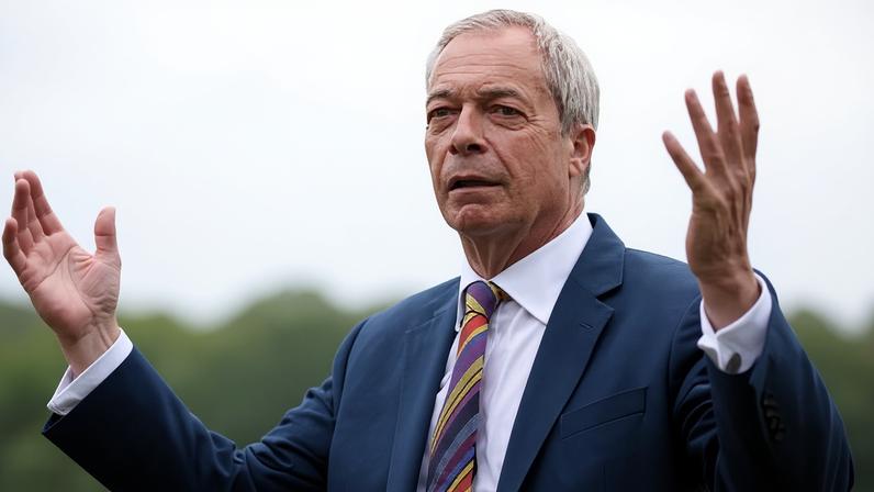 Farage in a blue suit and colourful striped tie gestures with both hands raised while speaking