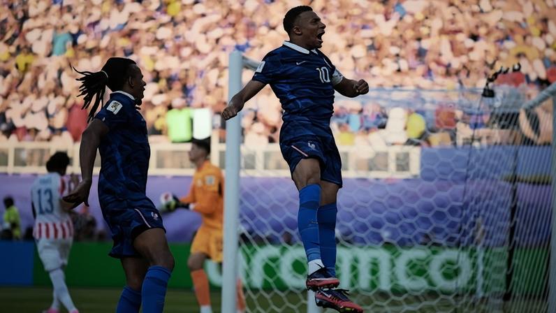 Kylian Mbappé celebrates scoring a penalty