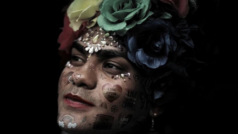 A parade-goer takes part in Pride in London 2026. Photograph: Carlo Paloni/Getty