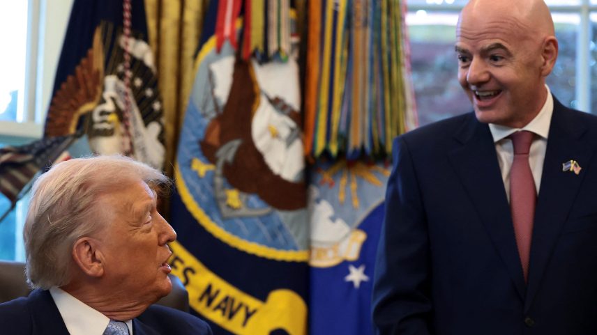 U.S. President Donald Trump sits next to FIFA President Gianni Infantino, as he meets with the White House Task Force on the FIFA World Cup 2026 in the Oval Office at the White House in Washington, D.C., U.S., November 17, 2025. REUTERS/Evelyn Hockstein