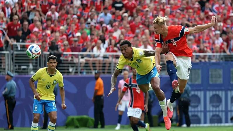 Erling Haaland heads in the opening goal
