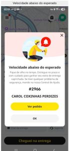 Captura de tela do aplicativo Keeta com pop-up de alerta informando "velocidade abaixo do esperado", associado ao pedido número 2966 do estabelecimento Carol Coxinhas Perdizes.