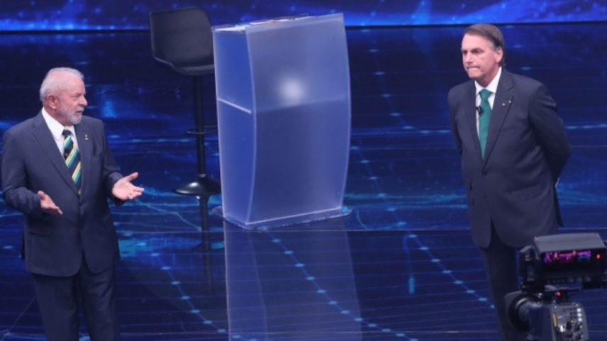Lula e Jair Bolsonaro durante debate da Band nas eleições de 2022.
