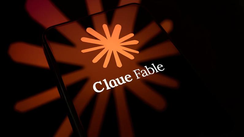 The Claude Fable logo is displayed on the screen of a smartphone placed on a reflective surface onto which the company's icon is projected, in Creteil, France, on June 10, 2026. Anthropic announces the release of two new Mythos-class artificial intelligence models designed for cybersecurity and biomedical research for both consumers and businesses
