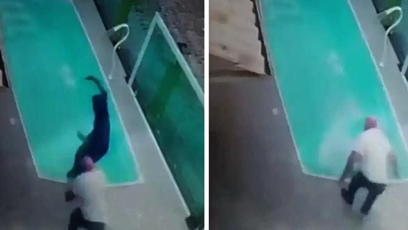 Homem empurra assaltante na piscina em SC