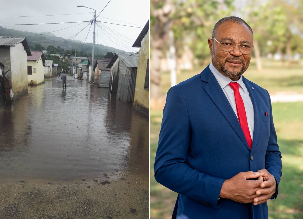 Vista de trecho inundado da cidade de Palé, em Annobón. Ao lado, Orlando Lagar, autoproclamado primeiro-ministro da ilha, que pertence à Guiné Equatorial (Foto: Acervo pessoal)