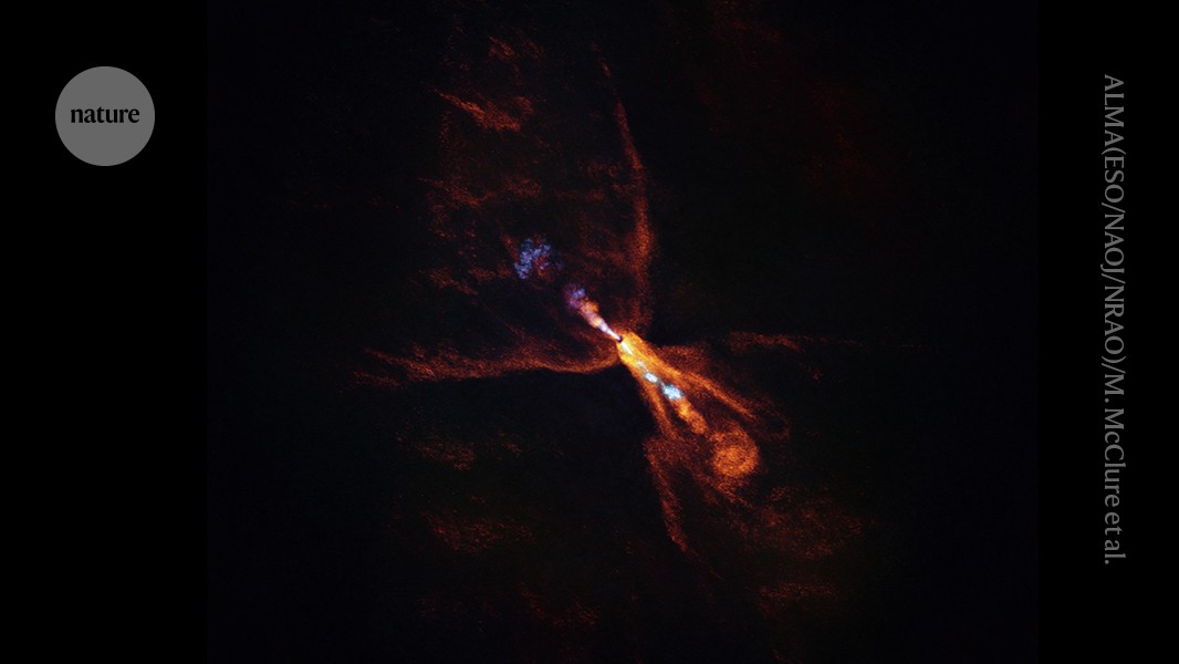 Astrônomos capturam pela primeira vez o nascimento de um sistema solar HOPS-315, conforme imagem do Atacama Large Millimeter-submillimeter Array no Chile (o laranja é monóxido de carbono se afastando da estrela central, o azul é monóxido de silício). (Foto: ALMA(ESO/NAOJ/NRAO)/M. McClure et al.)