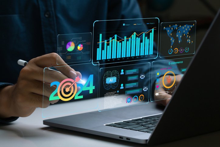 Empresário trabalha em laptop mostrando o painel de tendências de negócios de 2024 com gráficos, métricas, IA, e-commerce e KPI. Profissional analítico planejando o crescimento dos negócios em 2024. Futuro da tecnologia empresarial no Ano Novo. (Foto: pcess609/Getty Images)
