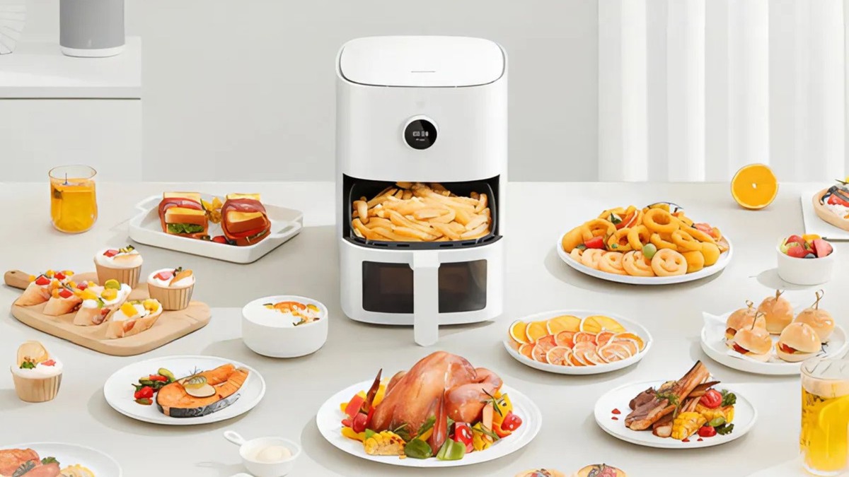 Air fryer: descubra como esquentar comida de forma segura e eficiente Alguns alimentos já cozidos podem ser reaquecidos no aparelho — Foto: Divulgação/Xiaomi