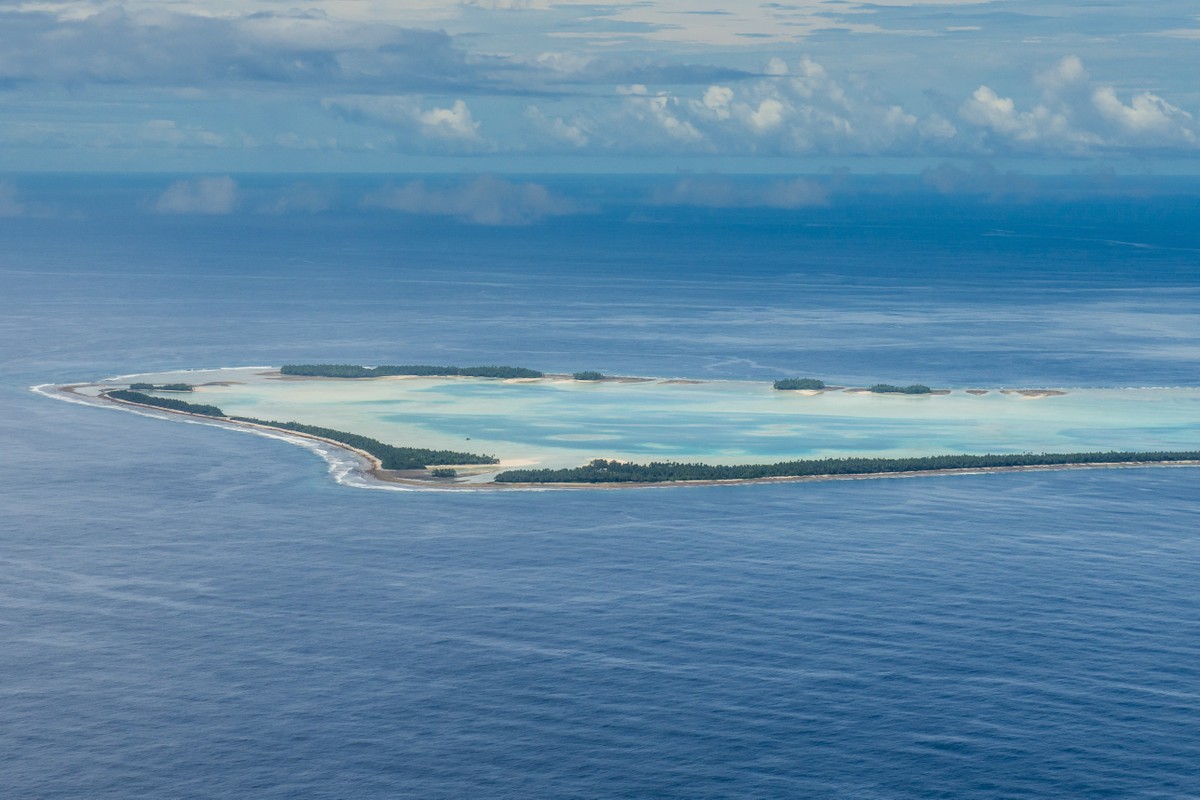 Um terço da população de Tuvalu pede visto climático inédito para a Austrália Vista aérea de Tuvalu (Foto: Michael Runkel / Robert Harding Premium / robertharding via AFP)