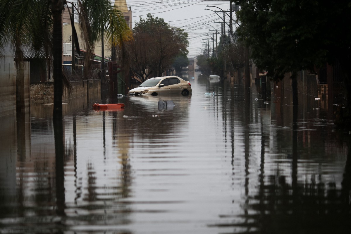 Brasil ocupa a quarta posição mundial em processos judiciais sobre crise climática Rua alagada em enchente no Rio Grande do Sul (Foto: Anselmo Cunha / AFP)