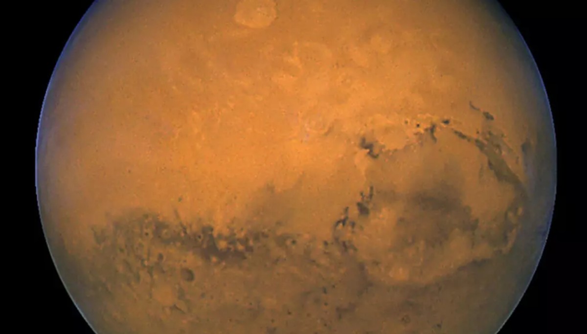 Astromóvel da Nasa revela indícios sobre a falta de vida em Marte Foto de arquivo tirada em 27 de agosto de 2003 pelo Telescópio Espacial Hubble da NASA mostra Marte fotografado minutos após a maior aproximação do planeta à Terra em quase 60.000 anos (Foto: AFP)