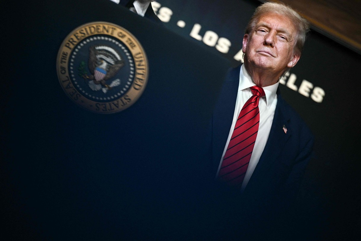 Donald Trump participa de evento na Casa Branca para lançar força-tarefa para Olimpíadas de 2028 (Foto: Brendan SMIALOWSKI / AFP)