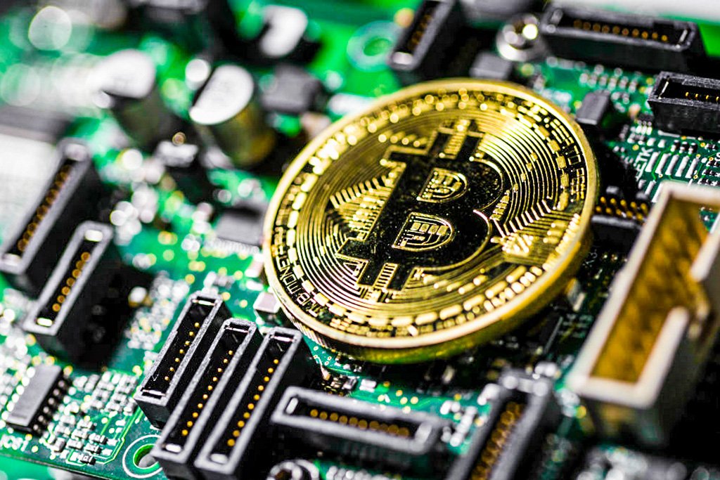 Usuário minera bitcoin sozinho e fatura R$ 1,8 milhão em lucro Mineração de bitcoin: minerador desafiou estatísticas (Foto: Bloomberg/Getty Images)