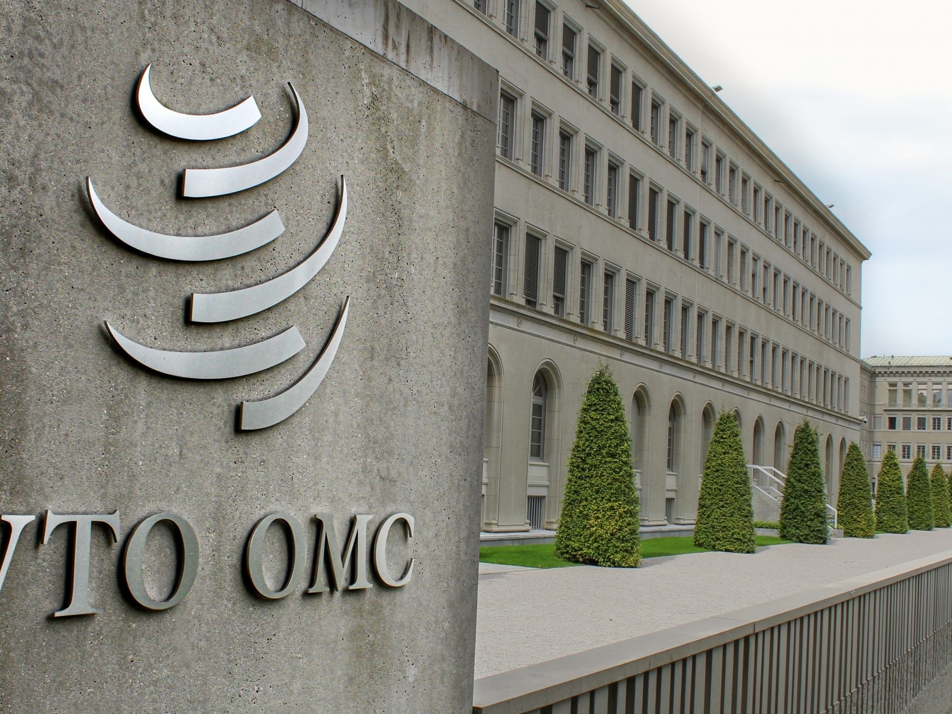 Brasil aciona OMC contra tarifas de Trump e busca diálogo internacional Sede da OMC, em Genebra (Foto: Reprodução)
