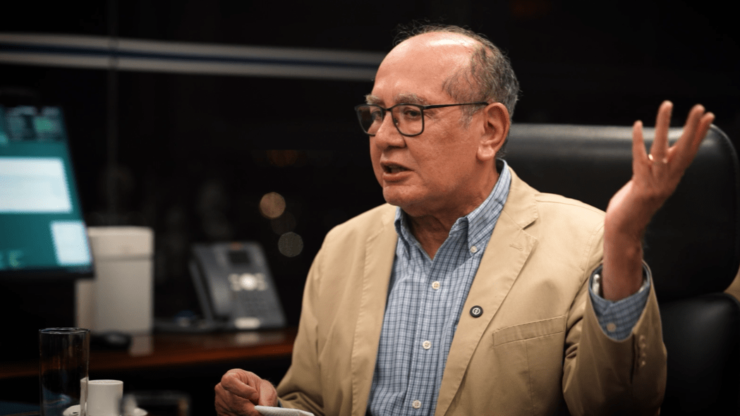 Gilmar Mendes destaca necessidade de enfrentar problemas além do IOF em Lisboa Ministro do STF, Gilmar Mendes, fala ao InfoMoney Entrevista (Foto: Reprodução)