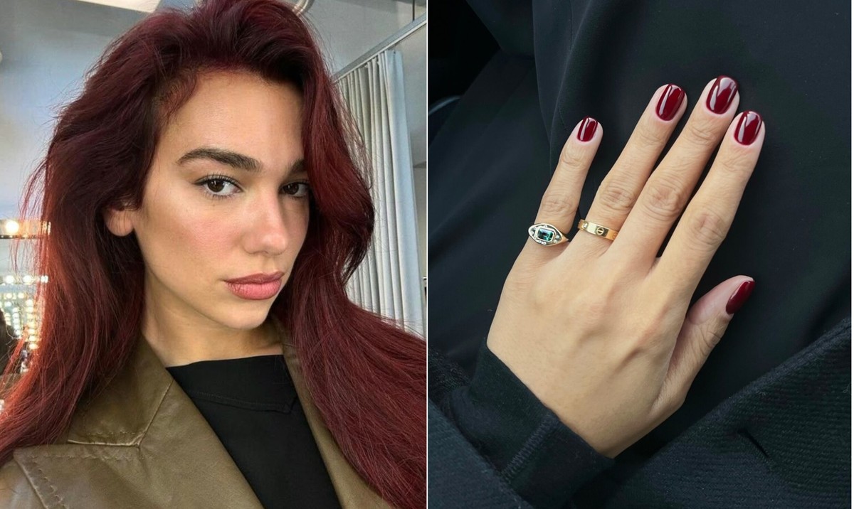 Cherry core se destaca como a cor tendência na beleza de 2025 Dua Lipa com a cor do momento: a cherry core, que aparece nos cabelos, nas unhas e na maquiagem (Foto: Divulgação)