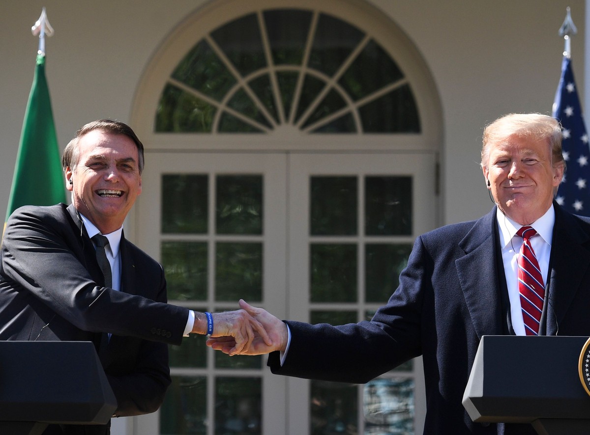 Jair Bolsonaro e Donald Trump (Foto: Jim Watson/AFP)