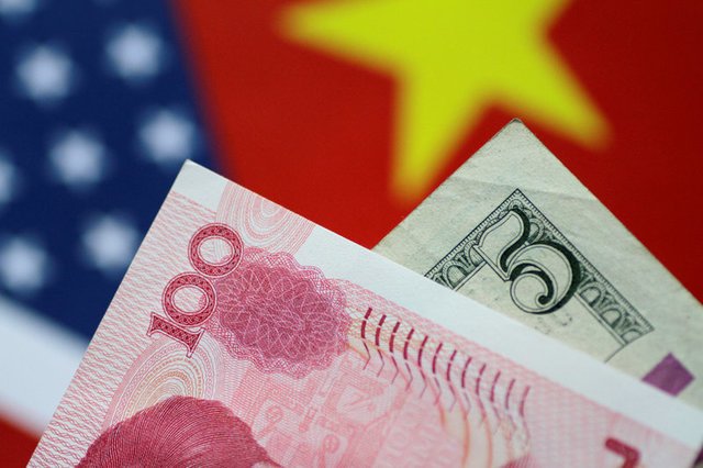 Gigantes chinesas buscam stablecoins atreladas ao yuan para desafiar o dólar Yuan pode ser alternativa, mas, no momento, mais de 99% das stablecoins existentes são denominadas em dólar (Foto: Thomas White/Reuters)