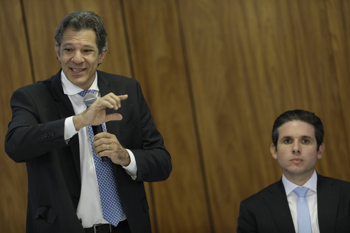 Ministro da Fazenda, Fernando Haddad, e o presidente da Câmara, Hugo Motta (Foto: Cristiano Mariz/Agência O Globo)